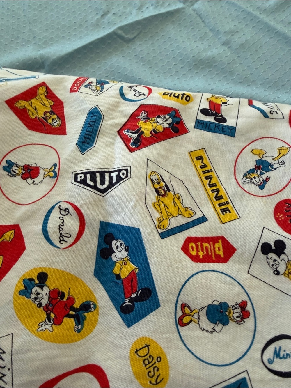 Disney Characters Cotton Fabric in White, Red, Blue & Yellow